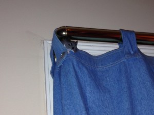 Athletic mouse is frightened of the menacing tigers awaiting on the floor below.