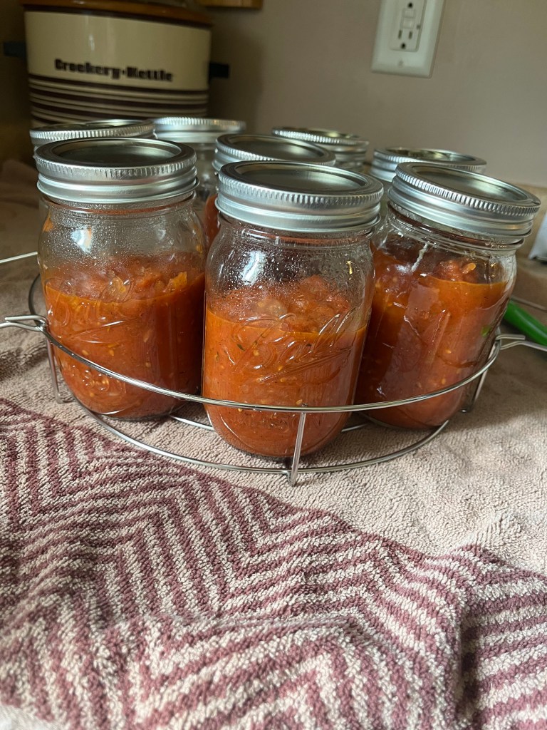 Jars full of pizza sauce