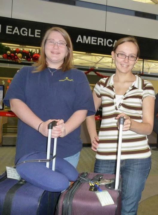 The author (right) with her friend CP (left) in the airport getting ready to go to London
