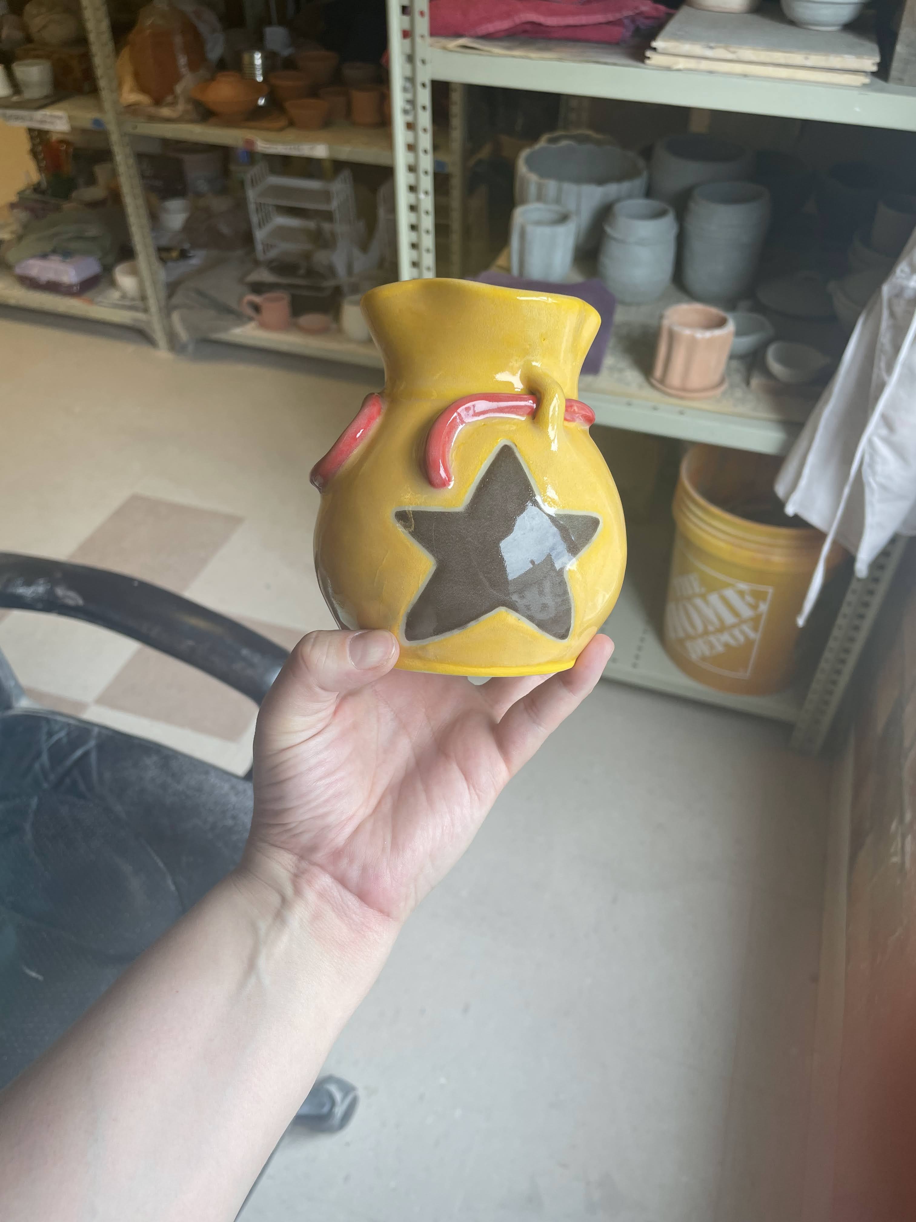 A bells bag (from animal crossing) made out of ceramic
